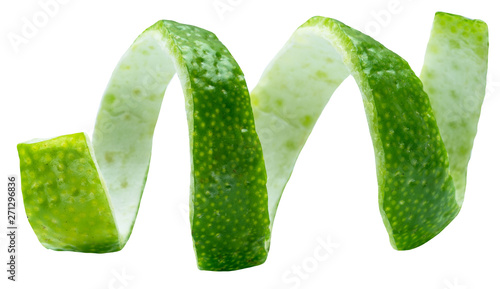 Twist of lime peel on white background. Clipping path. © volff
