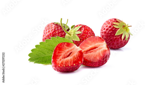 Fresh Strawberries  with leaves isolated closeup on White Background