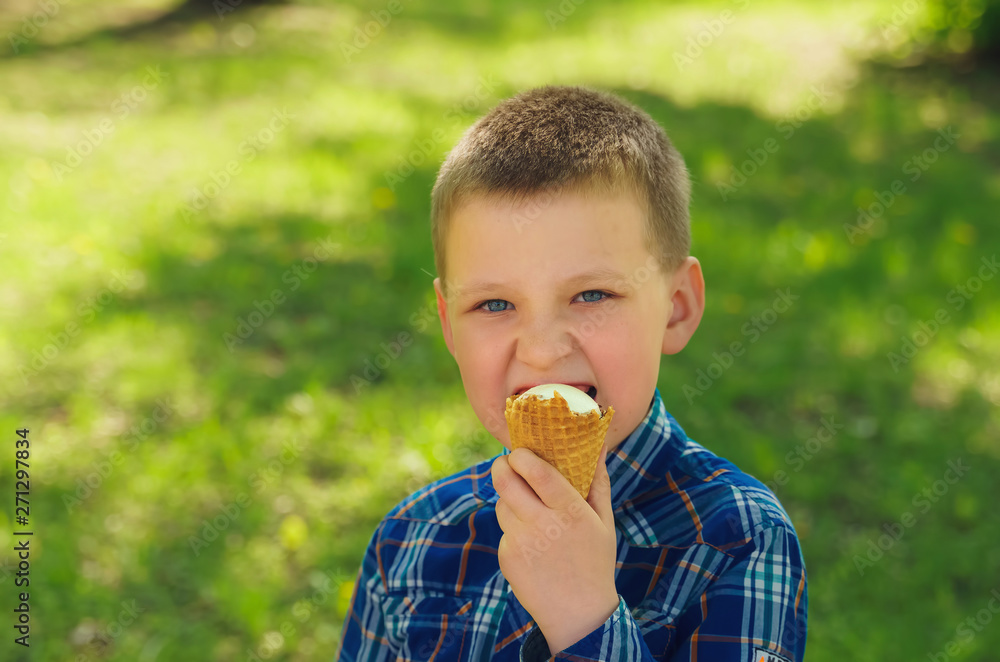 kid holding a wafer ice cream in hand kid holding a wafer ice cream in hand