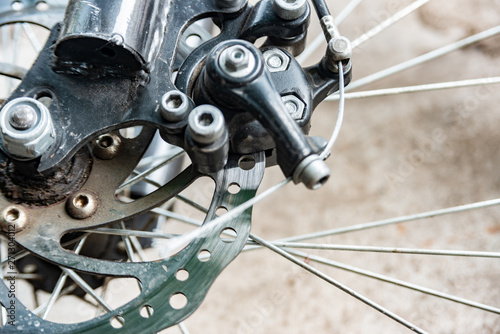 Transmissions and brakes on the bike, chain, sprocket and disc brakes.