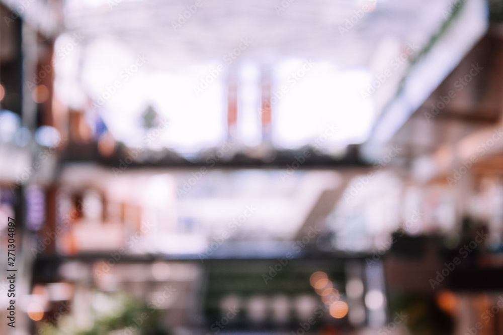 Defocused blurred image of shopping mall. Defocused blurred image of shopping mall.