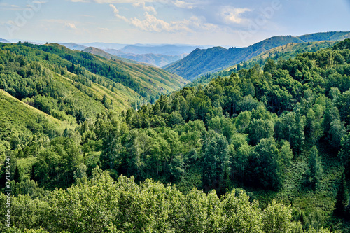 Beautiful panoramic aerial summer view at sunset to the Bukhtarma mountains in the valley of the river Irtysh  eastern Kazakhstan