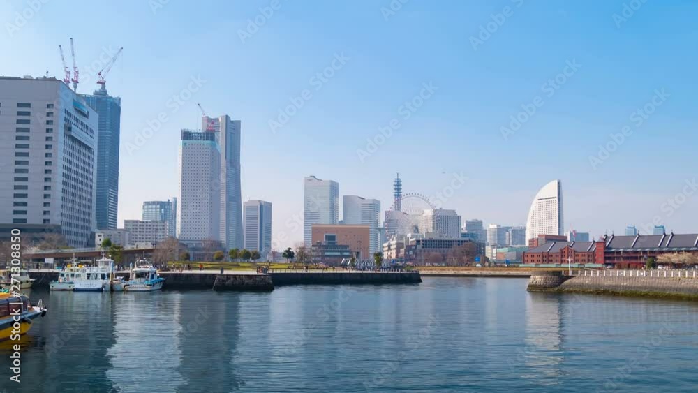time lapse of Minatomirai, view from the bay in Yokohama city, Japan time lapse of Minatomirai, view from the bay in Yokohama city, Japan