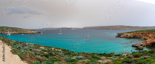 Pure crystal turquoise water of Blue Lagoon in Comino Malta