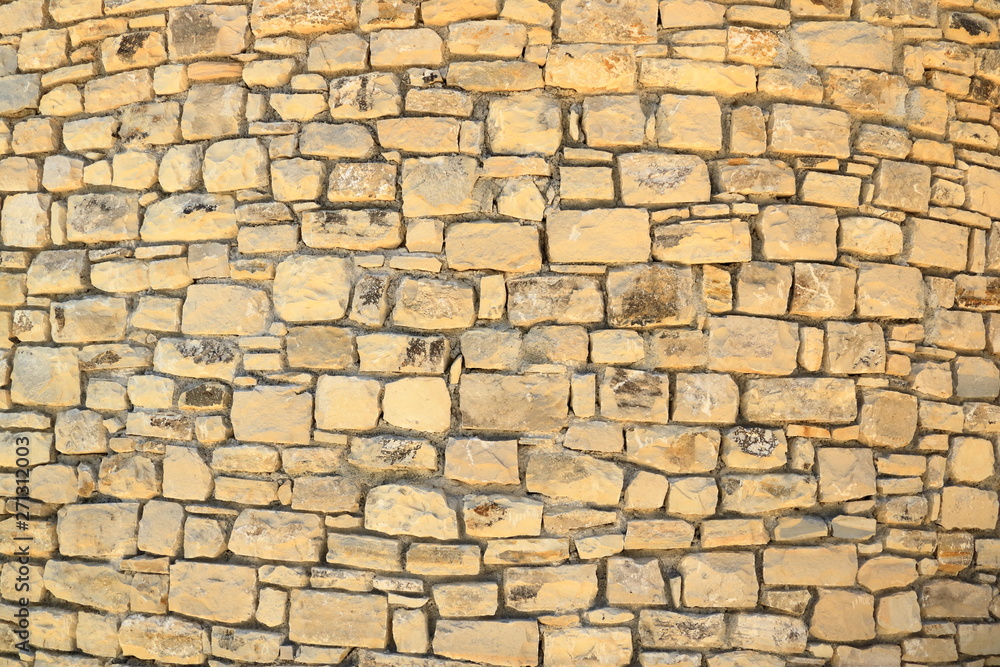 Big yellow wall from stone bricks