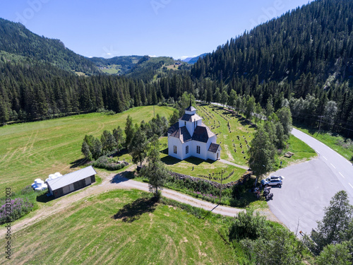 Amotsdal church and cemetery are in the Amotsdal small mountain village in Seljord municipality in Telemark, Norway, Scandinavia photo