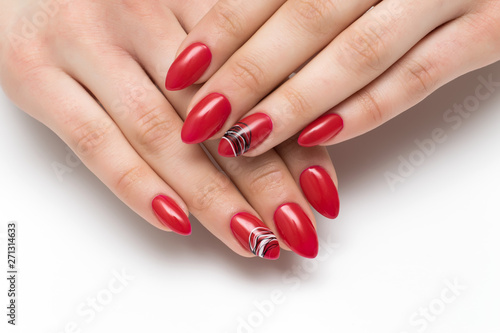 summer bright, red, scarlet manicure on long sharp nails with a black-and-white spiderweb on untitled nails on a white background.