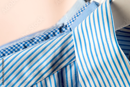 Cloth Hangers with Shirts. Men's business clothes. Fashion