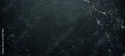 Panel kuchenny z motywem Black stone background. Top view. Free space for your text.