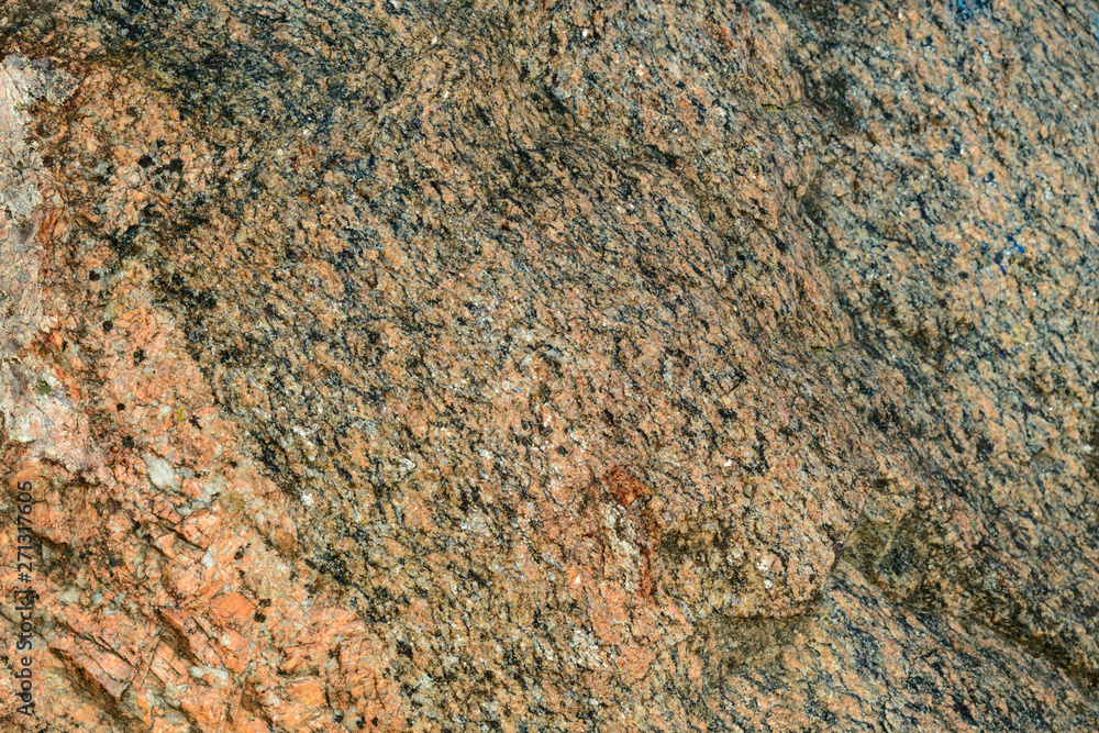Red granite rock background texture close up Red granite rock background texture close up