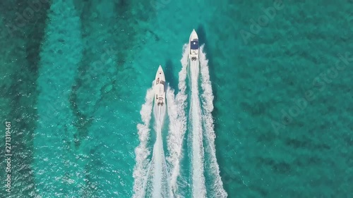 drone bird view of 2 boats in the bahamas. summer vaction