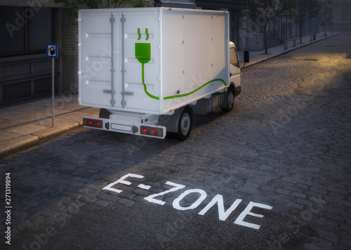 electric truck in electric cars only zone with highrise in the background