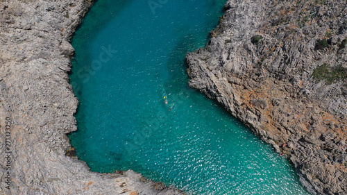 Aerial drone photo of heavenly turquoise rocky beach in shape of fjord of Seitan limania or Agiou Stefanou, Chania - Akrotiri, Crete, Greece photo