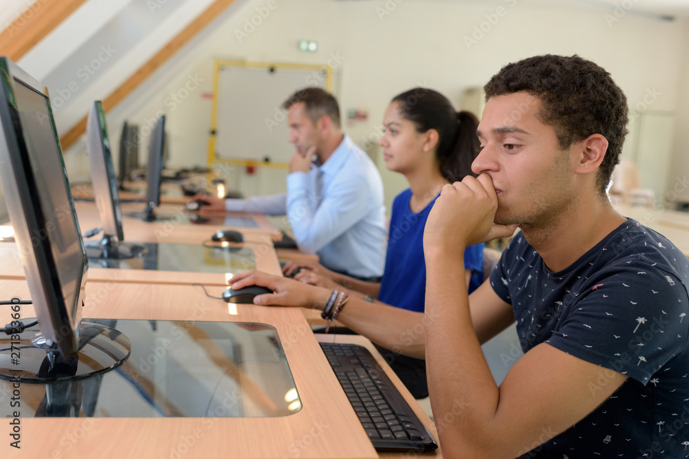 young students working with the computer young students working with the computer