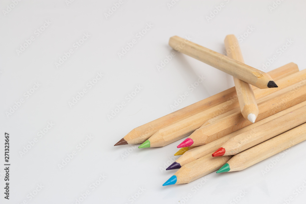 Colored pencils lies on a white background Colored pencils lies on a white background
