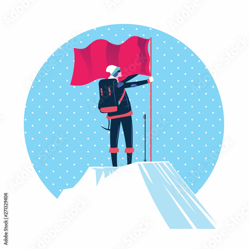 Human with flag standing on top of the mountain peak