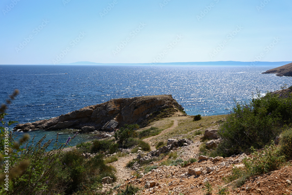 Rocky summer bay shore in the Adriatic sea, Croatia. View from the hill