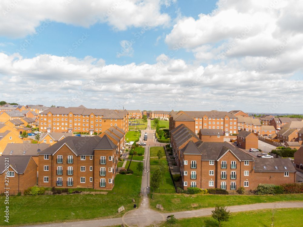 Aerial photo over looking the area of Leeds known as Beeston in West Yorkshire, showing the newly built housing estate taken on a sunny part cloudy day. Aerial photo over looking the area of Leeds known as Beeston in West Yorkshire, showing the newly built housing estate taken on a sunny part cloudy day.