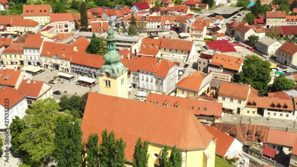 Croatia, town of Samobor, main square and church tower from drone, town skyline, circle shot with drone Croatia, town of Samobor, main square and church tower from drone, town skyline, circle shot with drone