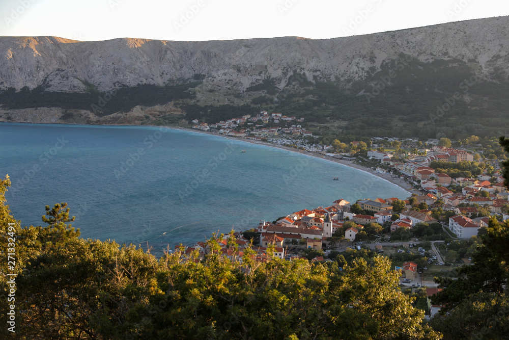 A view to the city on a shore of Adriatic sea from the rocky hill in Croatia, different color tones