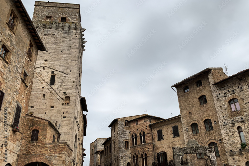 San Gimignano, an Italian medieval village with characteristic stone towers. San Gimignano, an Italian medieval village with characteristic stone towers.