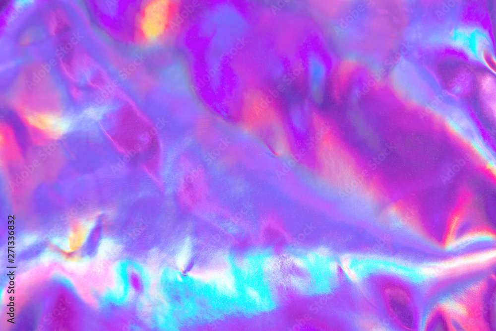 Abstract trendy holographic background. Real texture in violet, pink and mint colors with scratches and irregularities