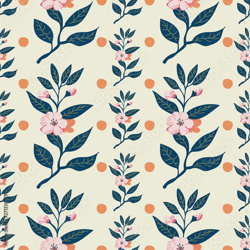 Pretty flower branch seamless pattern with polka dots on a light beige background. Vector. Light pink, orange and green color palette. Great for gift paper, textiles, fashion, home decor.