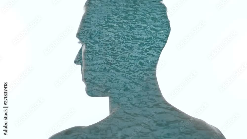 Double exposure mysterious man and raindrops falling in water Double exposure mysterious man and raindrops falling in water