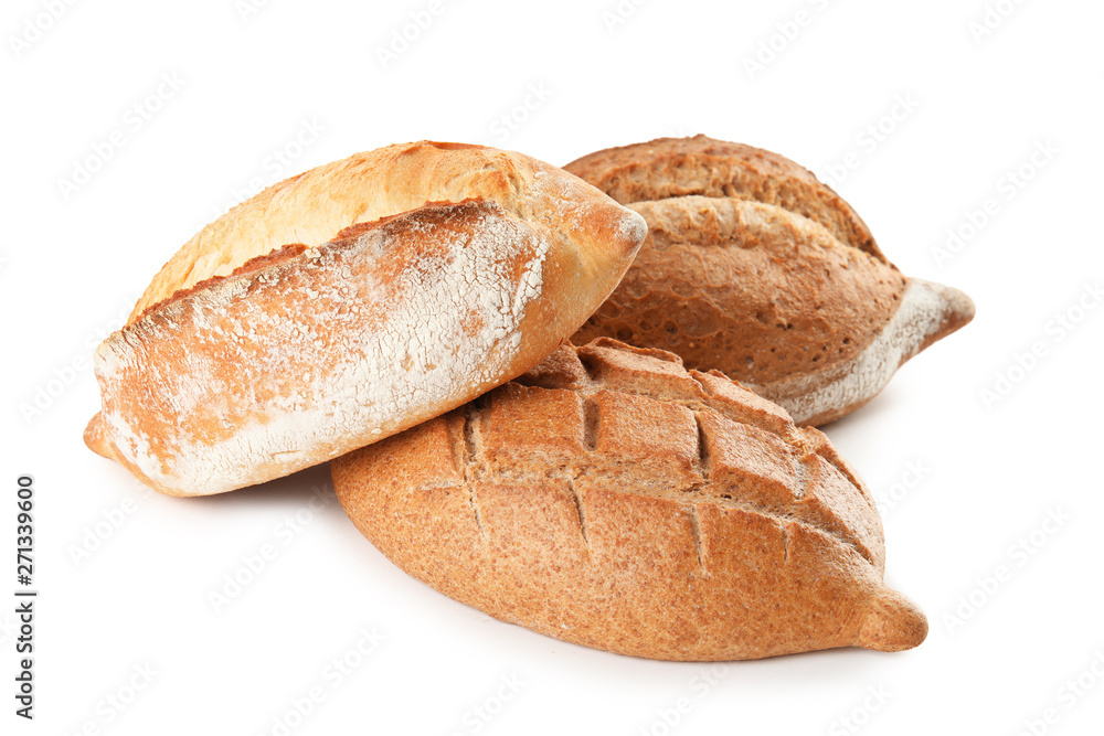 Loaves of fresh bread isolated on white