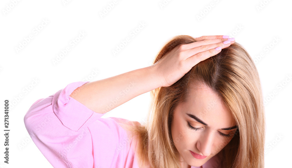 Young woman with hair loss problem on white background Young woman with hair loss problem on white background