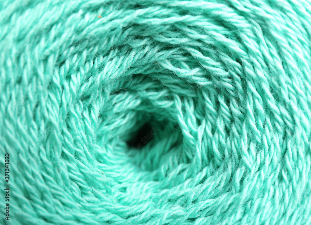 Clew of knitting threads as background, top view. Sewing stuff Clew of knitting threads as background, top view. Sewing stuff