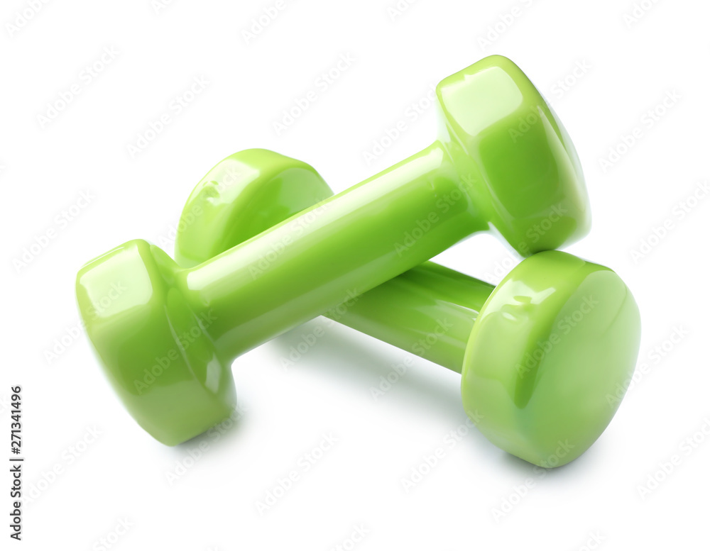Color dumbbells on white background. Home fitness Color dumbbells on white background. Home fitness