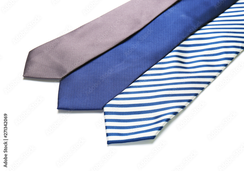 Color male ties isolated on white, closeup Color male ties isolated on white, closeup