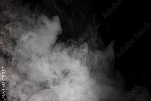 White vape smoke isolated on black background