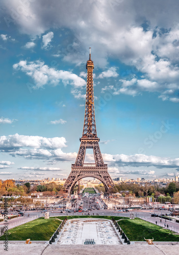 Eiffel Tower and fountain at Jardins du Trocadero at sunrise in Paris, France. © Augustin Lazaroiu