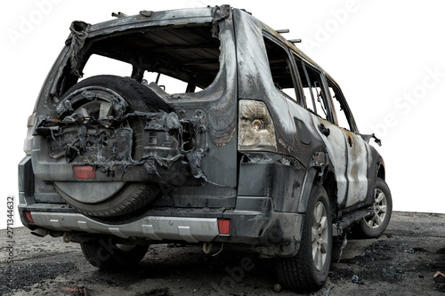 partially burned down car for use in photomontage, the SUV after the fire, isolate