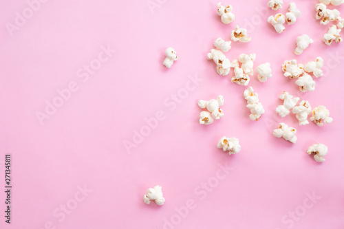 Popcorn on pink background 