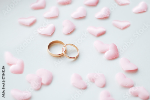 Wallpaper Mural Wedding rings on a white background in pink hearts Torontodigital.ca