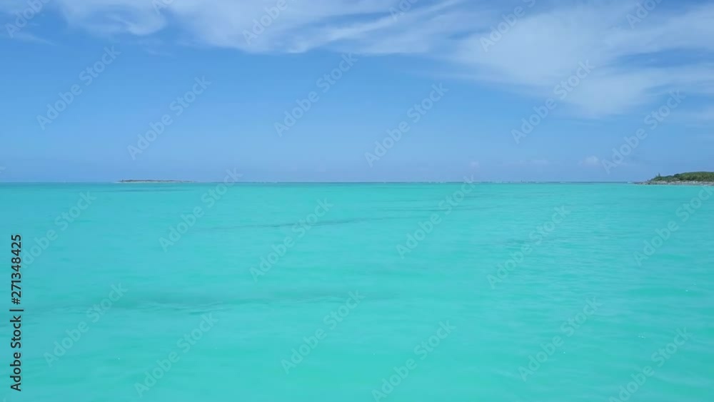 Female snorkeler in turquoise waters. exuma bahamas Female snorkeler in turquoise waters. exuma bahamas