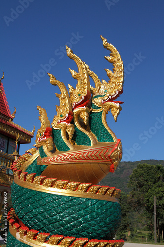heads of Naka or Naga or serpent in buddhist temple in Thailand © changphoto