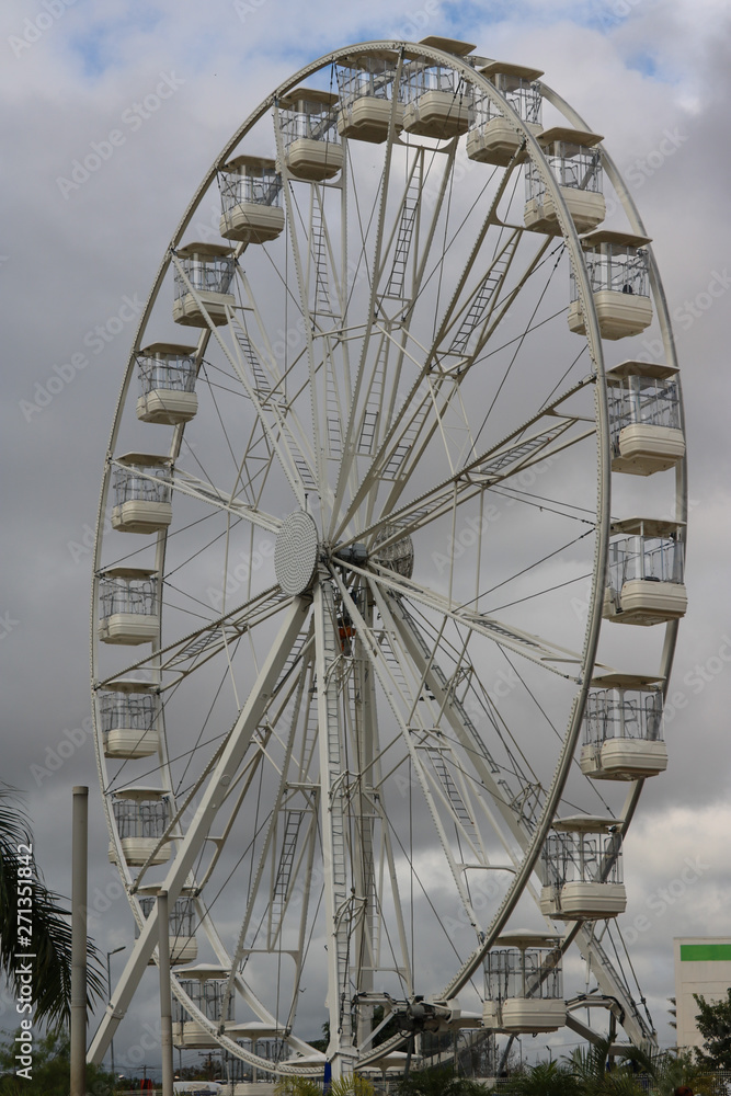 ferris wheel on background of blue sky