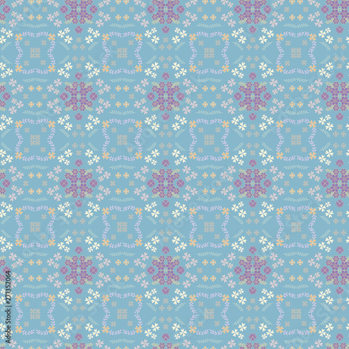 Beautiful vector floral pattern with pastel flowers on a gentle blue background.
