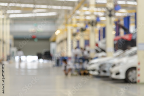 Abstract blur of auto repair service at garage. use for background