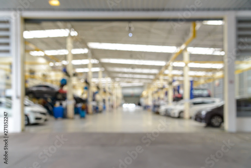 Abstract blur of auto repair service at garage. use for background