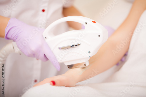 Body Care. Laser Hair Removal. Beautician Removing Hair Of Young Woman's Armpit. Laser Epilation Treatment In Cosmetic Beauty Clinic. Hairless Smooth And Soft Skin. Health And Beauty Concept