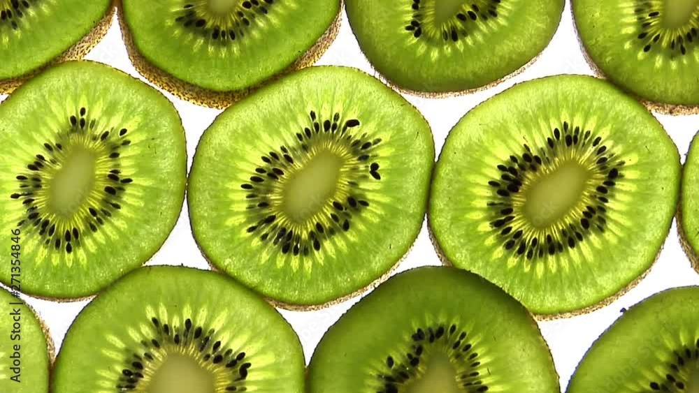 Full Frame Slices Of Kiwis Rotate Through Frame Full Frame Slices Of Kiwis Rotate Through Frame
