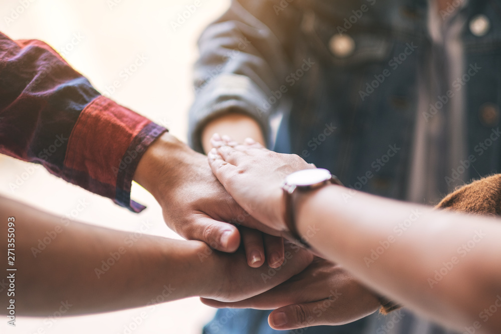 Closeup image of businessman putting their hands together in the meeting