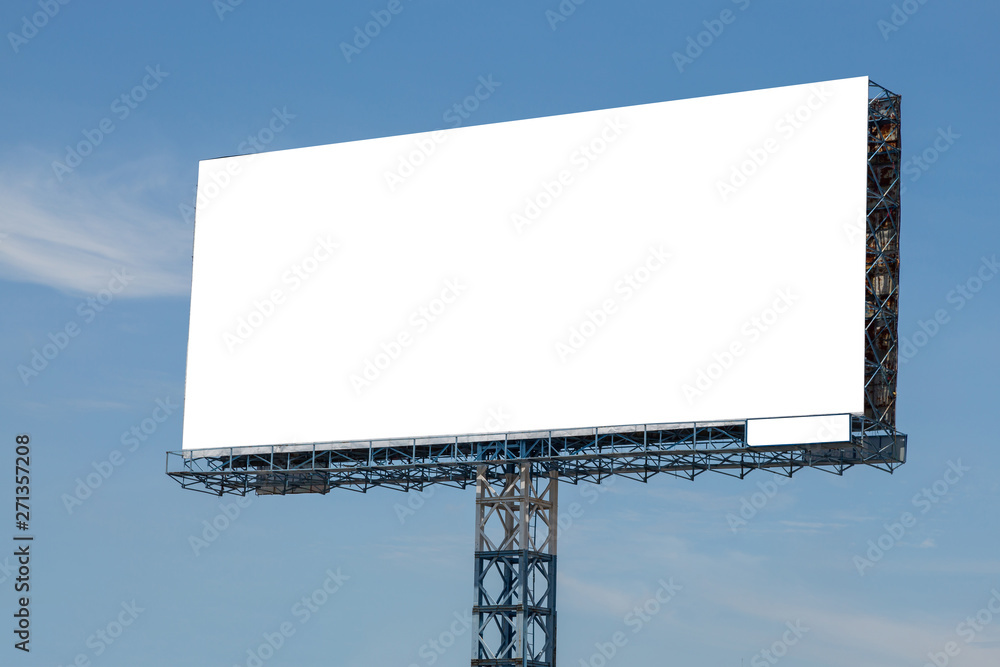 White billboard with blue sky and clouds