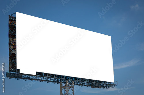 White billboard with blue sky and clouds