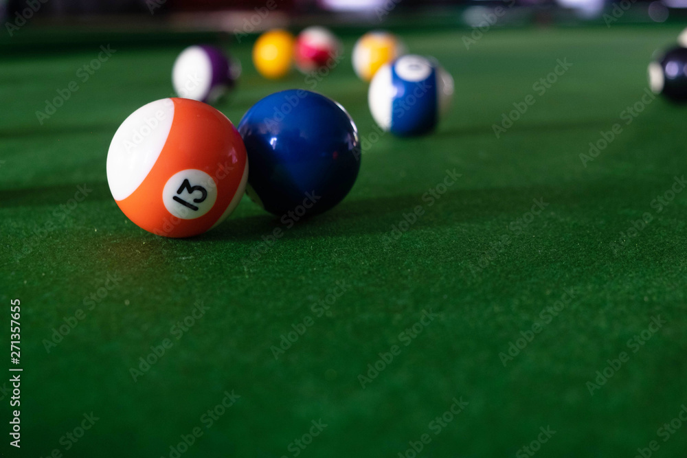 Playing, establishing a snooker ball, a red ball and a ball with numbers Playing, establishing a snooker ball, a red ball and a ball with numbers